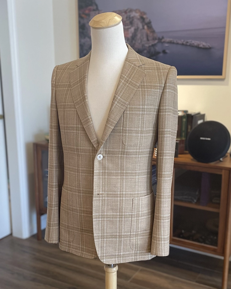 Completed bespoke sport coat on the form, ready for final fitting